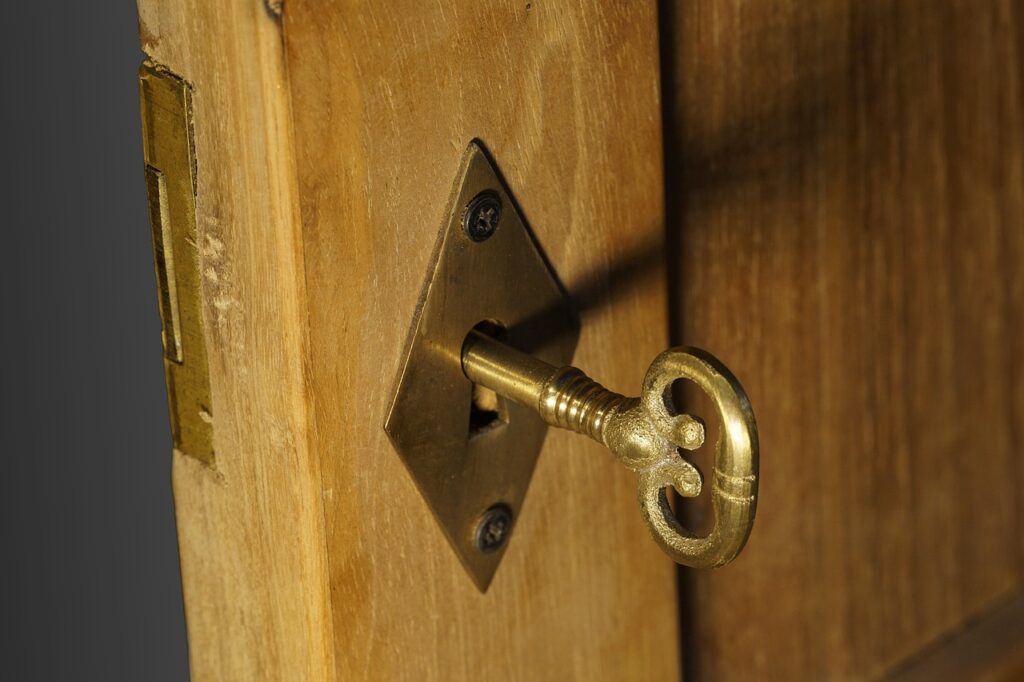 Old Skelleton key unlocking door. The key to SEO keyword research tips Colorado Springs